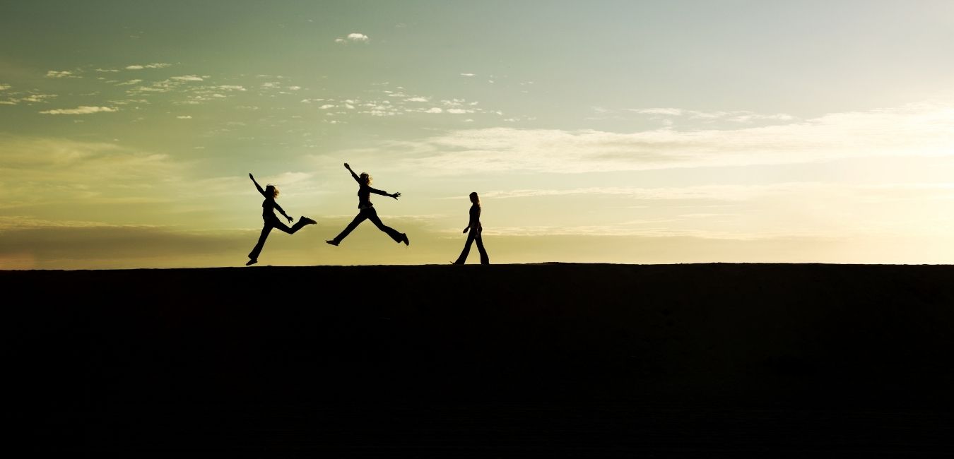 When You See Your Fitness as a Long-Game, Life Changes! Silhouette of a woman progressing through a jump with a sunset background.